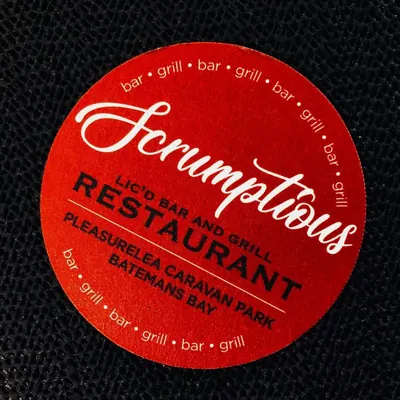 Scrumptious Restaurant logo